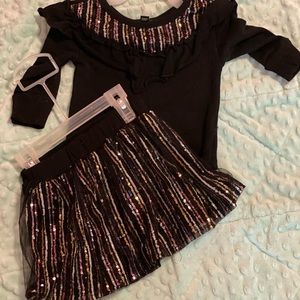 12 month sequin skirt and top. Worn once, new condition.